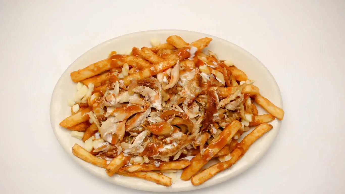 Chicken Shawarma Poutine at Friends Donair & Shawarma Winnipeg — hand-cut fries with chicken shawarma